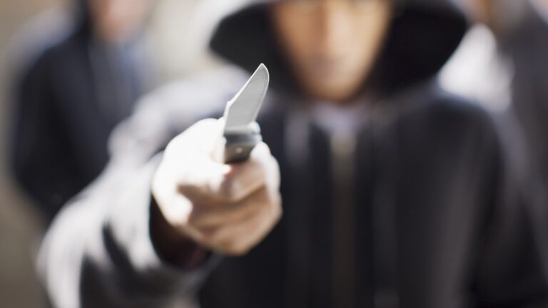 Man threatening with pocket knife