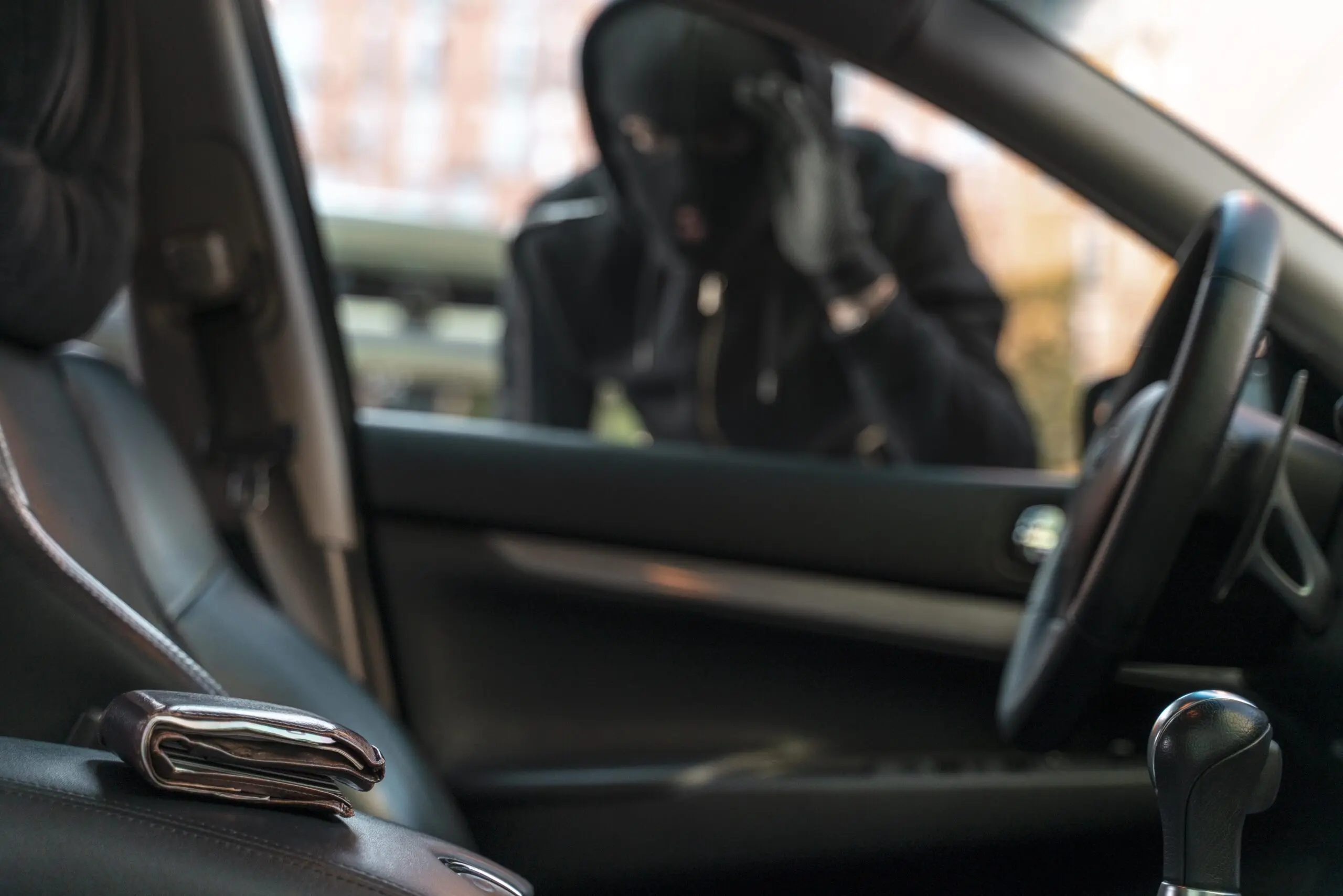 close-up-man-trying-break-into-car